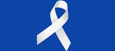 white ribbon on dark blue background