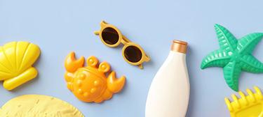 beach toys on a bright blue background