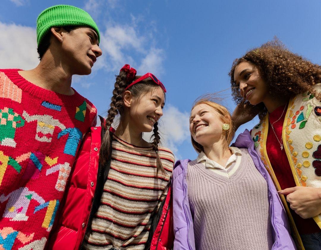 A group of friends cuddled together